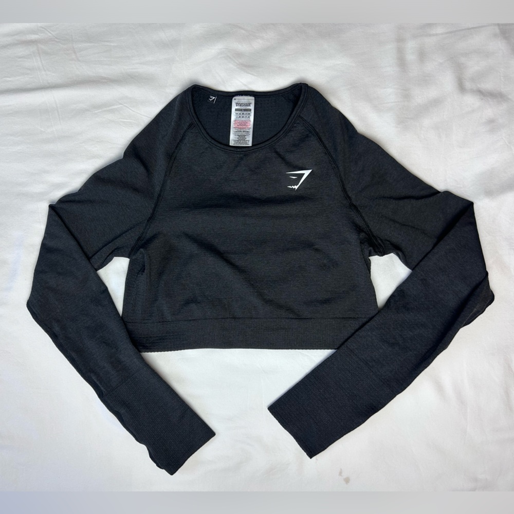 Never worn, gymshark black cropped long sleeve with thumb holes